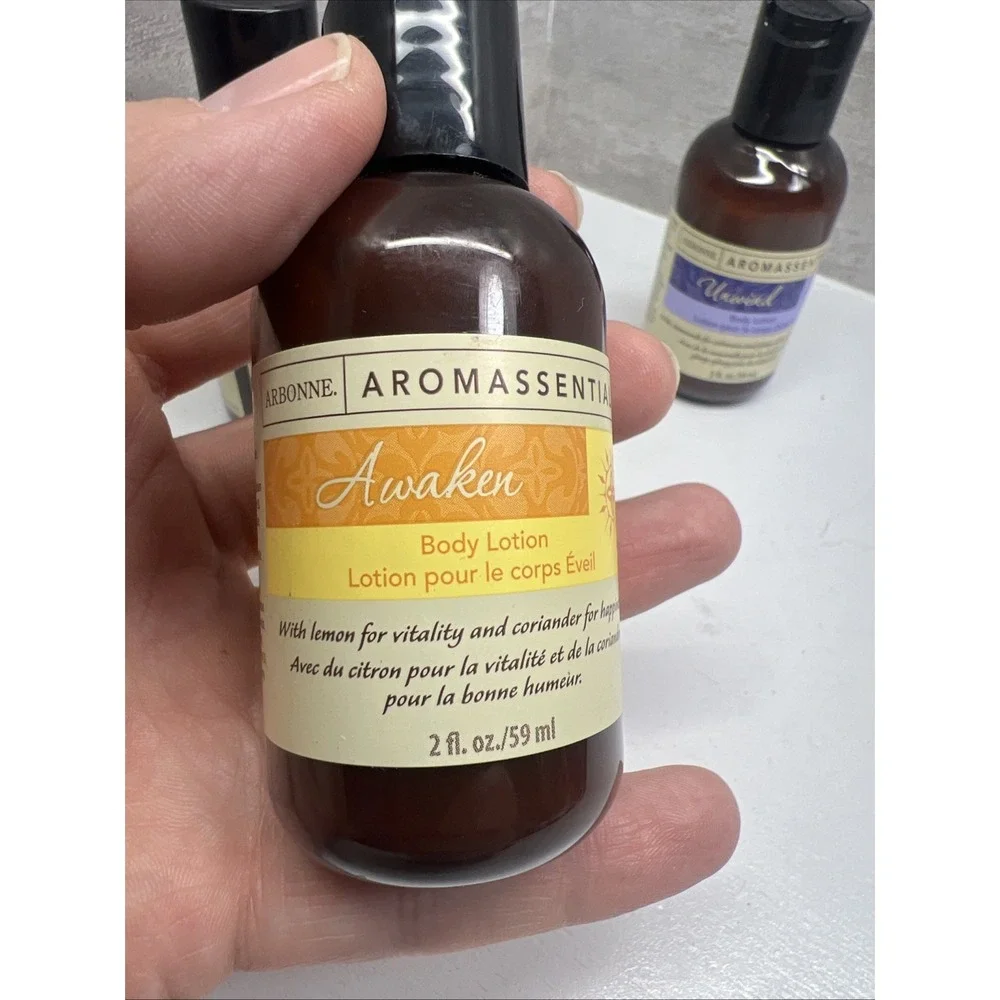 Lot Of 3 Arbonne Aromassentials 2- UNWIND 1- AWAKEN Body Lotion 2 oz